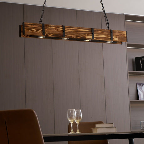 Seen from below against a paneled wall above a table set with wine glasses