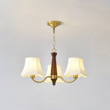 The three light build, brass arms and three fabric bell shades