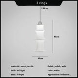 Detail of the ceiling fitting and the top segment of the silk column
