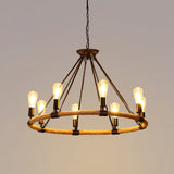 The eight light single tier lit warm, rope binding visible on the rim