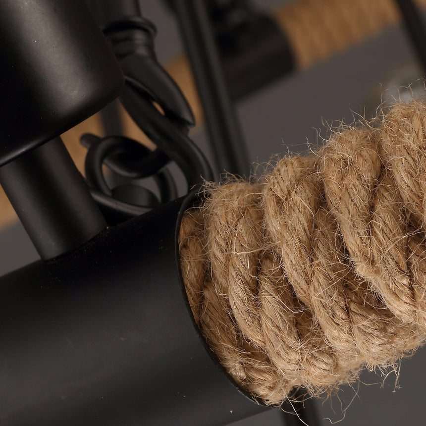 Hemp rope bound tight around the iron rim, shown at close range