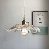The clear lotus shade seen alone against a plain pale background