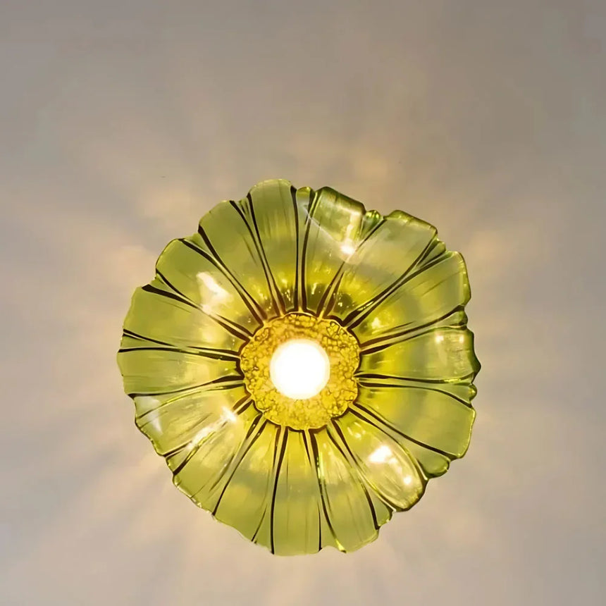 The green lotus shade seen from directly below with the bulb lit