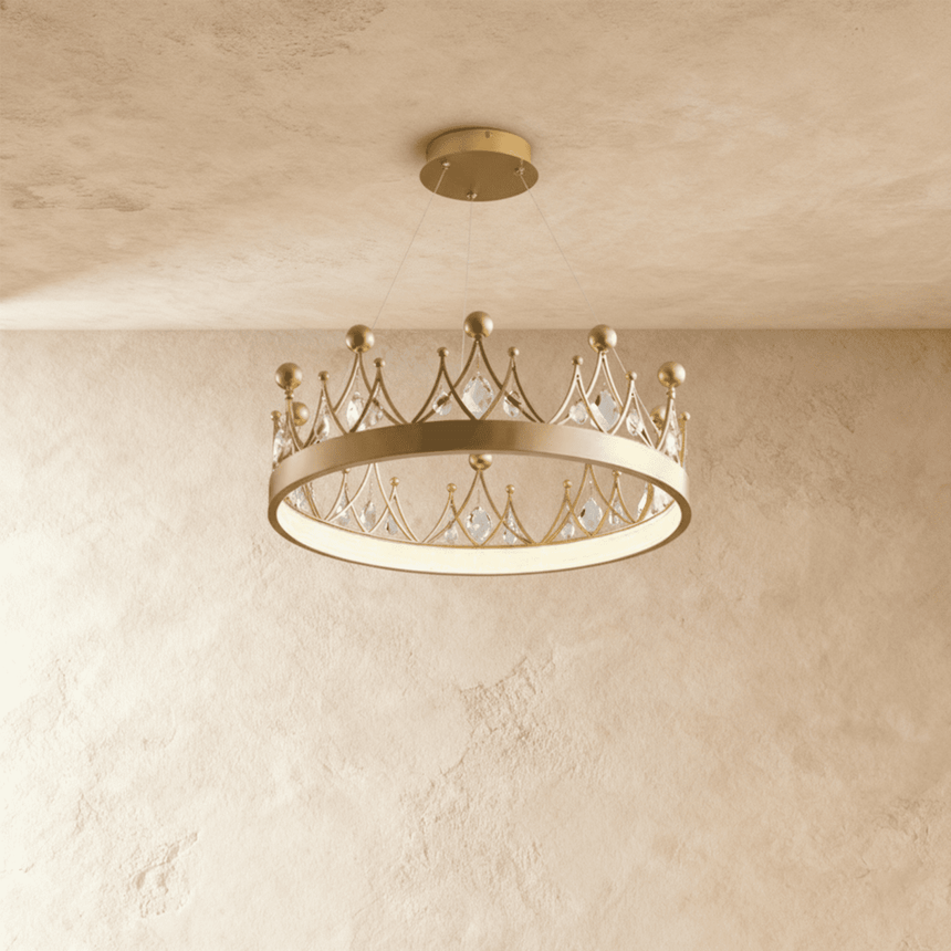 A shallow gold crown ring set with leaf shaped crystals, lit close to the ceiling