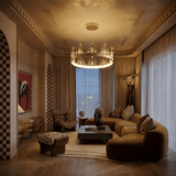 The ring lit in a living room above a curved sofa, artwork and a coffee table