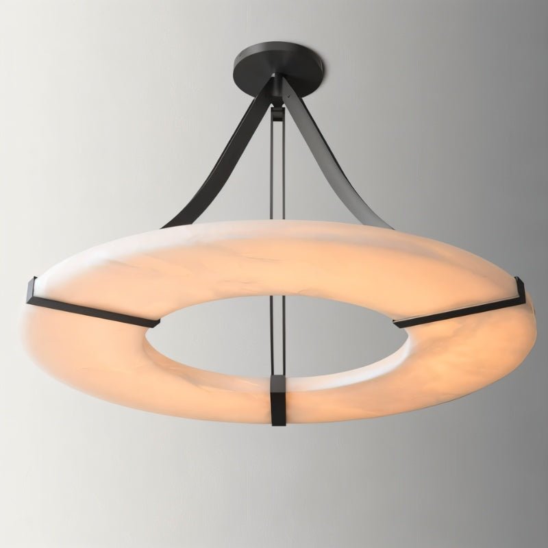 The lit ring with its three black straps and the canopy above them