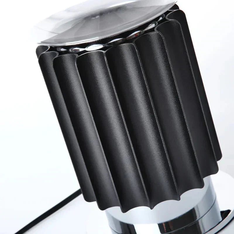 Aluminum and glass table lamp collection for living spaces