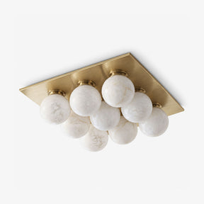 Luxury flush mount ceiling lights with nine alabaster balls on a brass square canopy