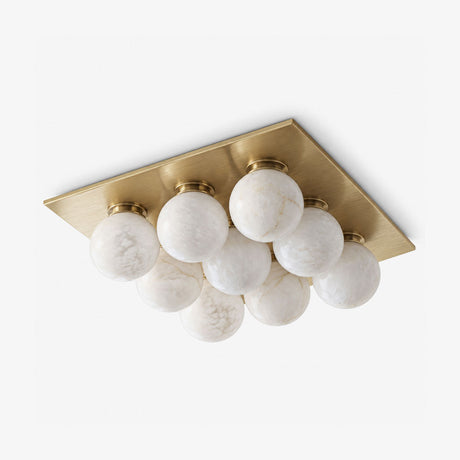Luxury flush mount ceiling lights with nine alabaster balls on a brass square canopy