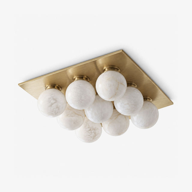 Luxury flush mount ceiling lights with nine alabaster balls on a brass square canopy