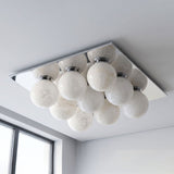 Brushed nickel version of the nine ball alabaster ceiling light seen from below