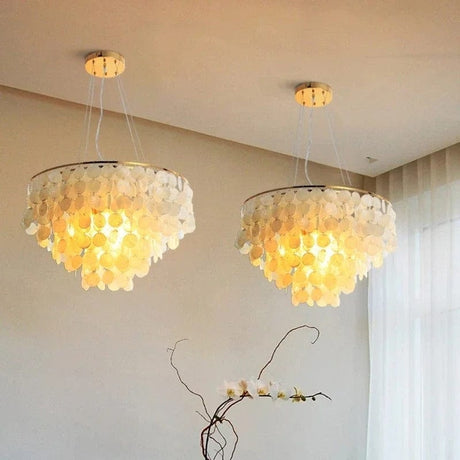 shell and iron chandelier with polished chrome finish