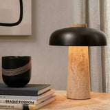 Stone and aluminum lamp with warm LED ambient glow for modern homes