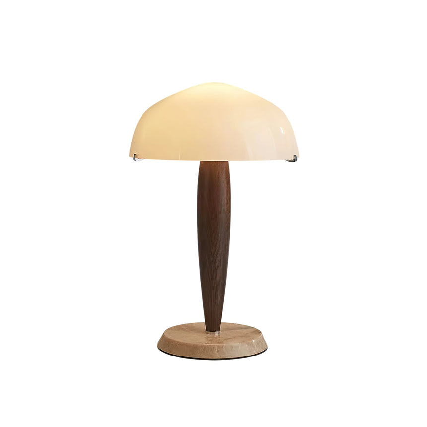 Full view of the marble base table lamp against a pale ground