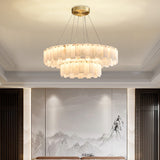Marble ring chandelier above a dining table
