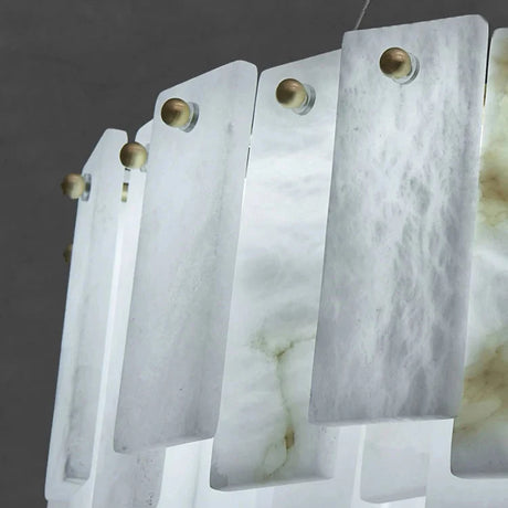 Close view of the upright marble slabs lit from within