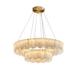 Two tier marble chandelier lit on its suspension wires