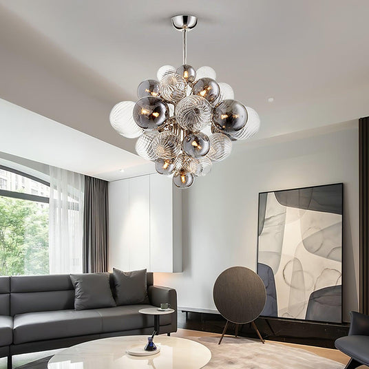 Arc chandelier close-up curved arm detail