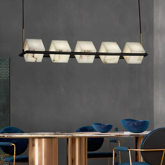 A long row of lit cubes above a copper dining table with blue chairs