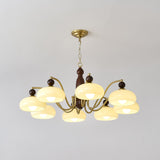 The chandelier seen from below in a room, arms radiating outward