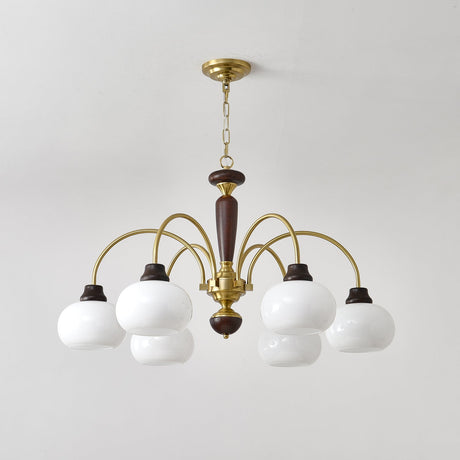 Rounded white opal globes and their walnut collars seen close