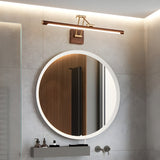 Walnut toned bar lit above a round mirror on a wood panel over a stone basin