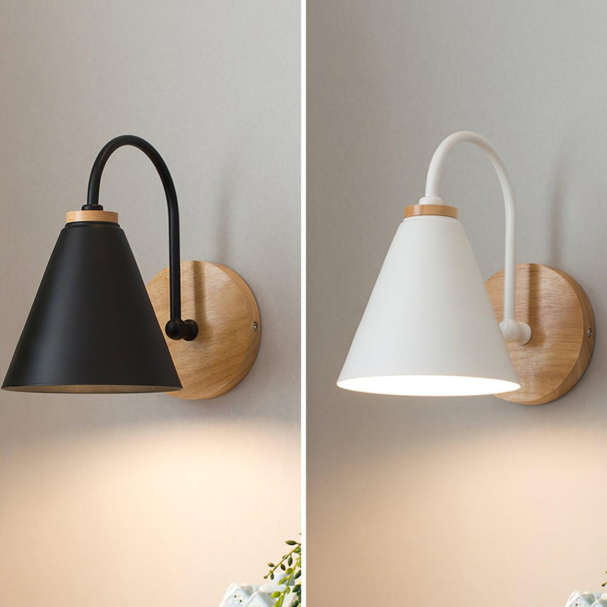 The black cone version next to the white cone version on a pale ground
