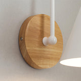 The round wood backplate with the stem joining it, grain running across