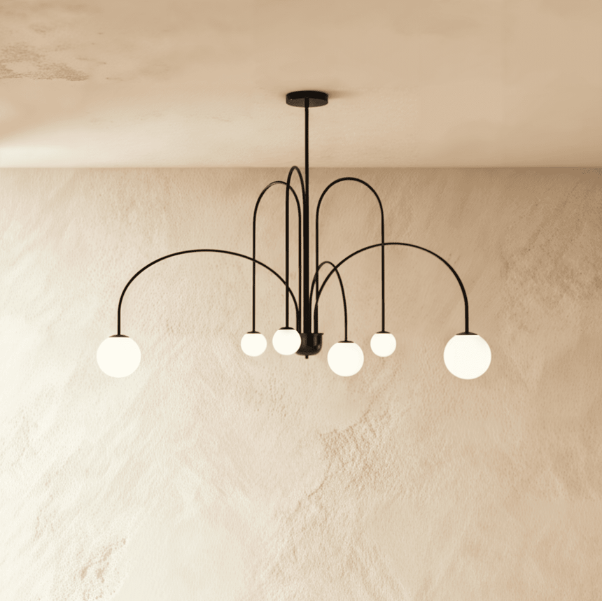 The black frame turned so the arched arms cross and the globes sit at depth