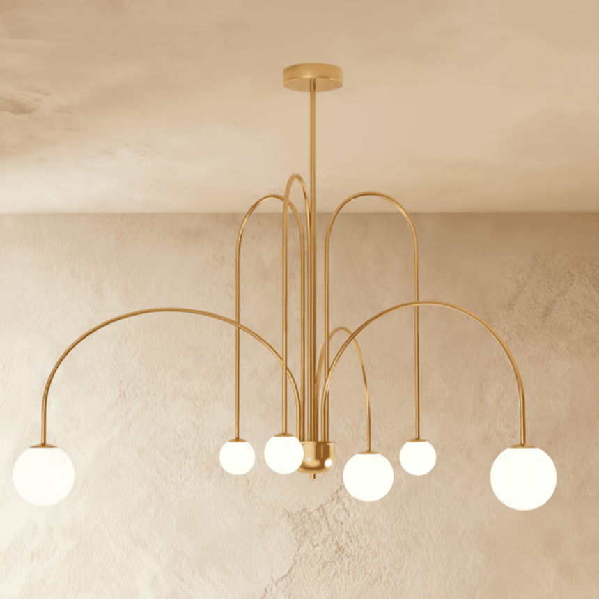 The gold frame turned so the arched arms cross above the lit globes