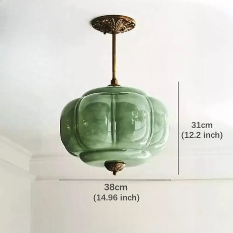 Green shade shown with its 38 cm width and 31 cm height marked on a plain field