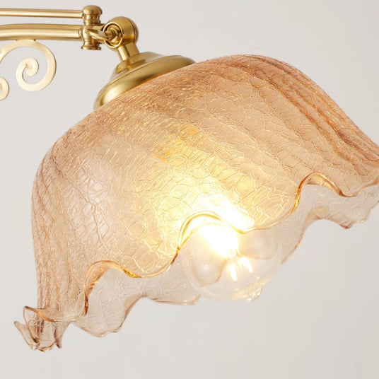 Close view of the ruffled crackle glass shade lit from inside