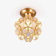 Mini ceiling light with clear glass petals set in a gold plated frame