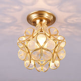 Clear glass petal ceiling light seen from the side, lit