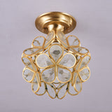 Clear glass petal ceiling light seen from below showing the wire frame