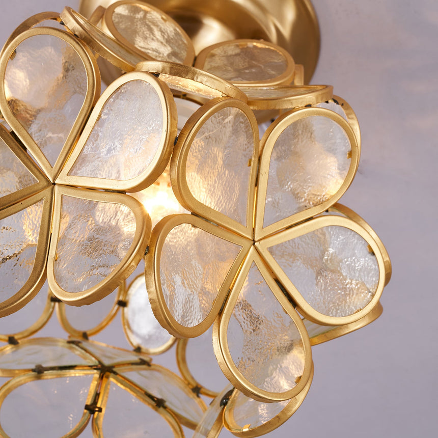 Close view of the clear glass petals and their wire loops