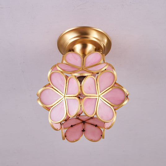 Pink glass petal ceiling light seen straight on