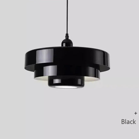 Layered metal shade in black on a plain background