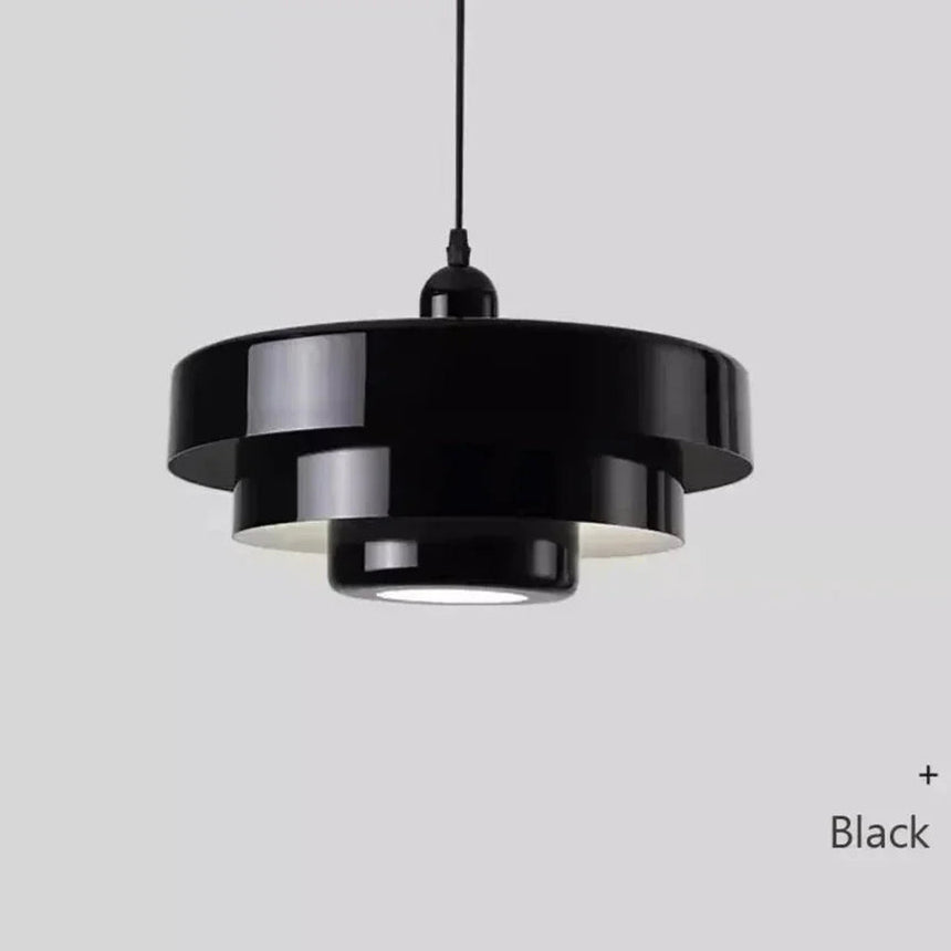 Layered metal shade in black on a plain background