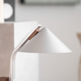 Close view of the cone shade edge and the top of the aluminum arc