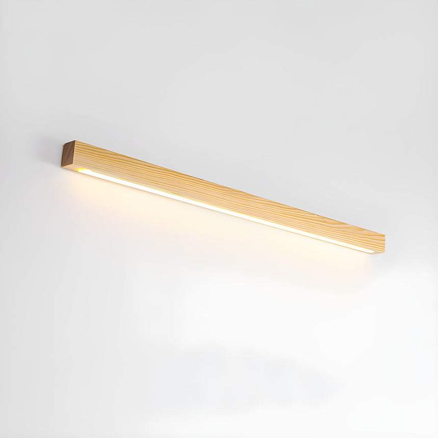 The long light pine bar lit, seen along its length from one end
