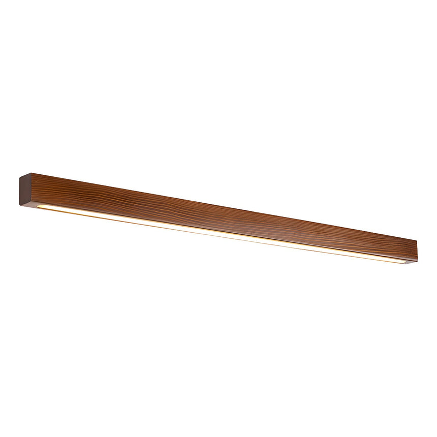 Walnut picture light bar lit and seen at an angle, the diffuser glowing