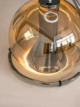Close view of the amber mirrored interior with the bulb showing inside