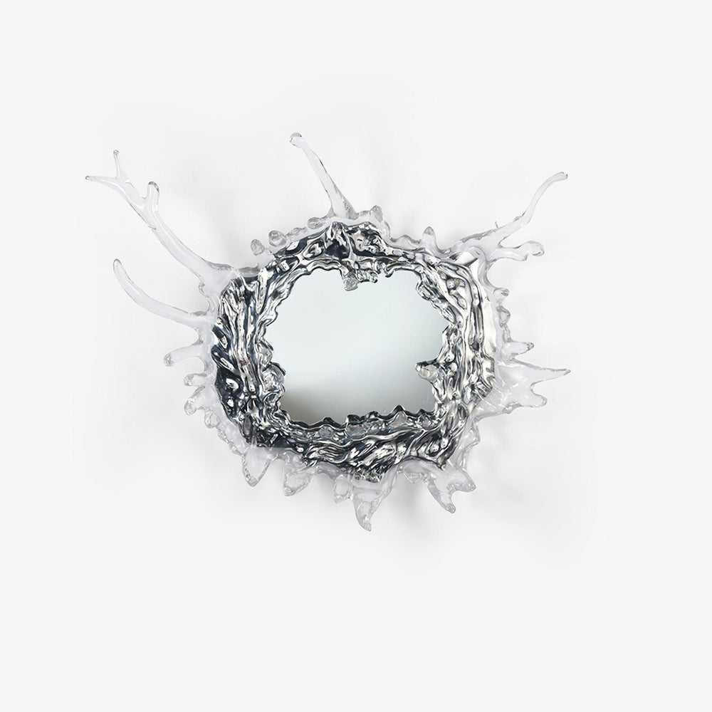Round mirror wall light framed by a sculpted splash of clear drops in a chrome finish
