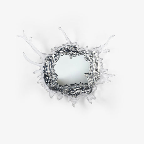 Round mirror wall light framed by a sculpted splash of clear drops in a chrome finish