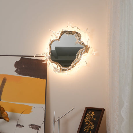 The mirrored light lit beside a large abstract painting and a sheer curtain