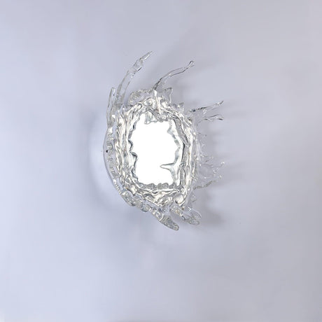 Side view of the splash frame and the mirror on a pale wall