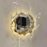 The gold version lit warm, light spreading behind the splash frame