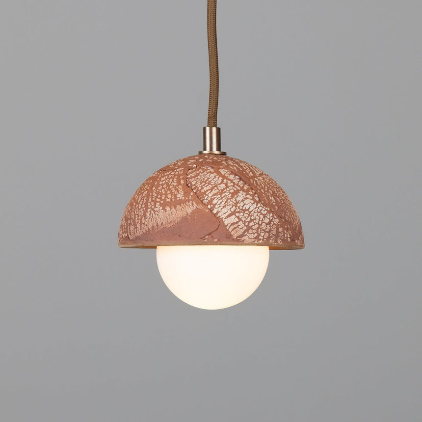 Ceramic dome pendant light with red iron finish