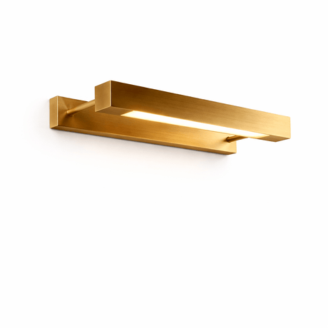 The bar in brushed gold seen at an angle, the diffuser glowing along it